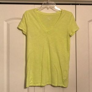Small V-neck lime green top.